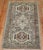 A charcoal color Persian Heriz Rug from the early 20th Century Measures: 2'9” x 4'4''