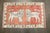 A pair of mid-20th century turkish rugs depicting multiple lions