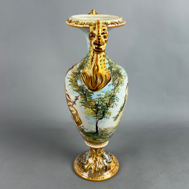 An imposing and dramatic large two-handled ligurian majolica vase, original and signed by the prestigious l.a.c.a....