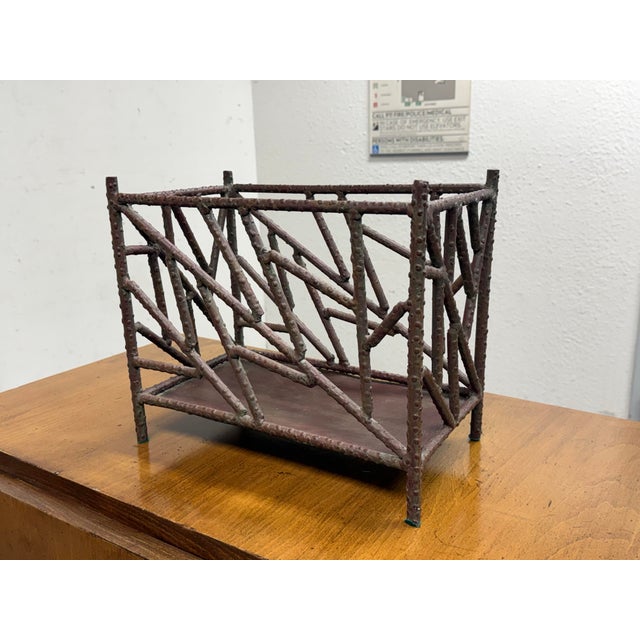 Design Plus Gallery presents an Adirondack Magazine Stand. Constructed with an open lattice framework, the magazine stand...