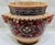 Hand-painted majolica jardiniere by Biagioli Ceramiche of Gubbio, Italy, featuring dramatic figural mask handles and...