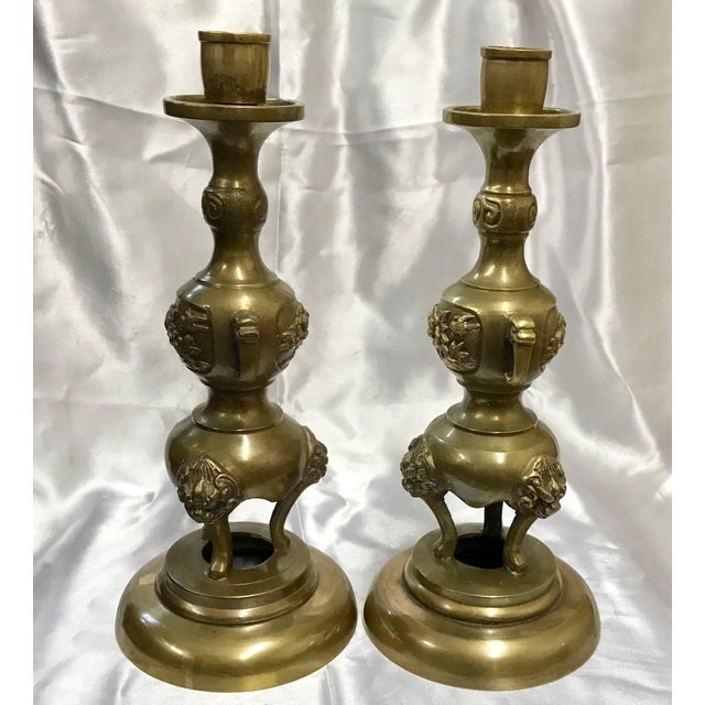 We are offering a pair of heavy cast brass candlesticks with several personalities. Starting at the smooth base, you will...