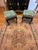 Charming pair of custom-upholstered stools featuring a vibrant teal-and-ivory zebra-pattern textile. The bold upholstery...