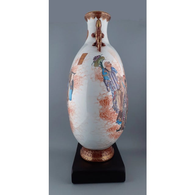 Chinese porcelain Eight Immortals baoyueping, a flask form vase with a white glazed exterior and a turquoise glazed...