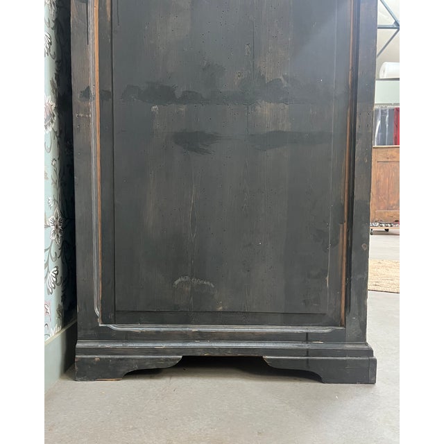 A characterful piece of antique workshop furniture with a beautiful original dark gray patina and a generous size. It...