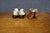 Charming Victorian group of two pairs of antique children’s shoes with an accompanying illustrated paper-covered keepsake...