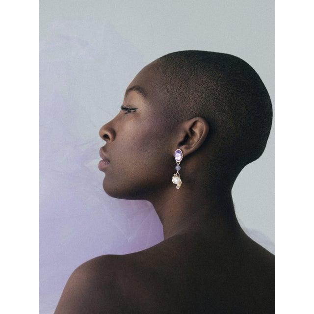 Earrings that look like they're a part of a bonbon box? With playful colors, Jade, and hand-carved flowers these floral...