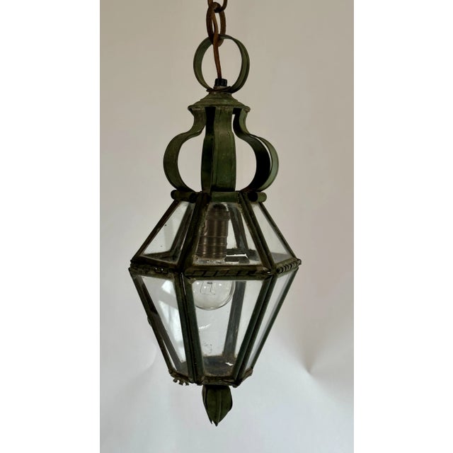 Semi-antique 1930s verdigris hanging lantern of octagonal shape with soldered panes of glass. Loads of hand-made detail...