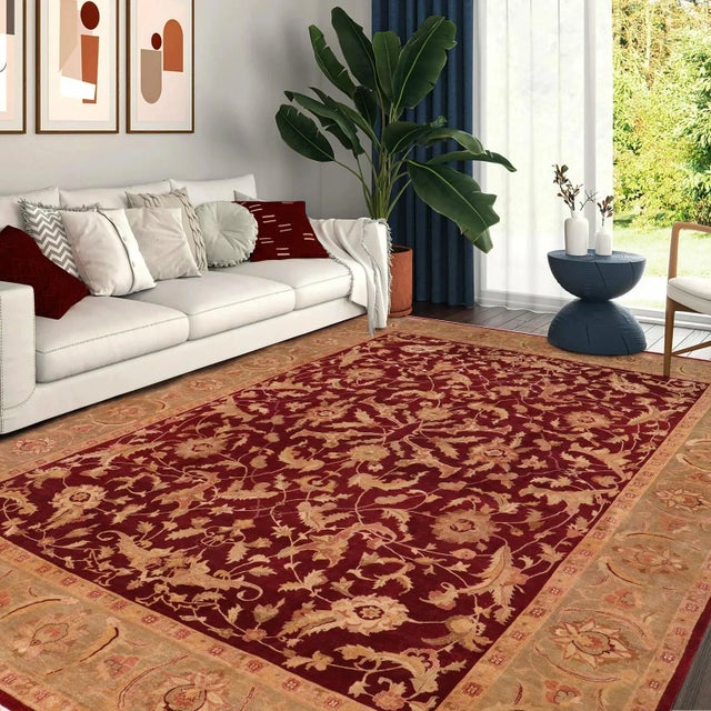 "Enhance the ambiance of your home with this magnificent Persian-influenced Turkish hand-knotted rug made by skilled...