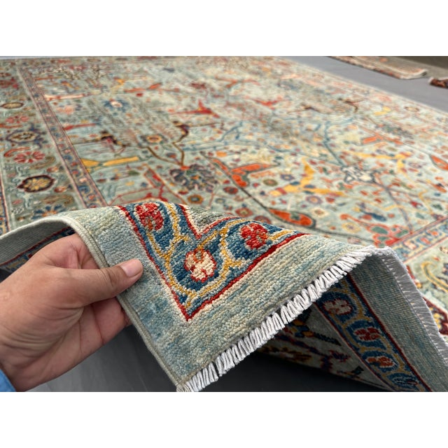 This rug is from Afghanistan, measuring 8'0 x 9'11 ft. Featuring earthy tones and a tribal look, it will enhance the...