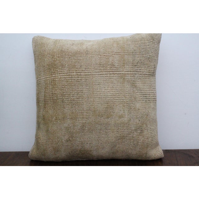 This Turkish pillow cover is made from the highest quality antique rug in 100% wool on the front. The back is covered in...