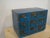 with 9 drawers with original handles. The back is made of compressed wood. The drawers measure 12 x 25 cm, height 9 cm.