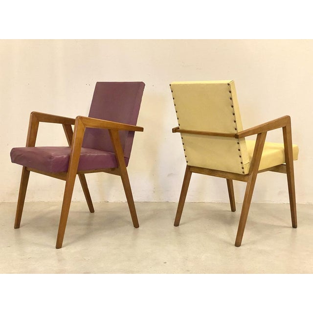 A pair of 50s, cherry wood, restored structure. The sessions are original in yellow and burgundy vinyl, therefore the...