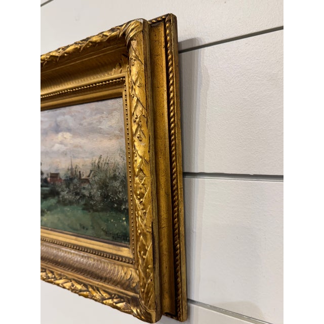 This is a lovely English landscape oil on canvas with village scene in the background. A charming 19th century-style scene...