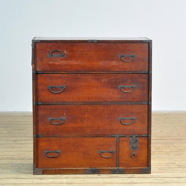 Traditional Japanese Tansu chest of drawers from the 1890s. Manufactured during the late Meiji era (1868-1912). This piece...