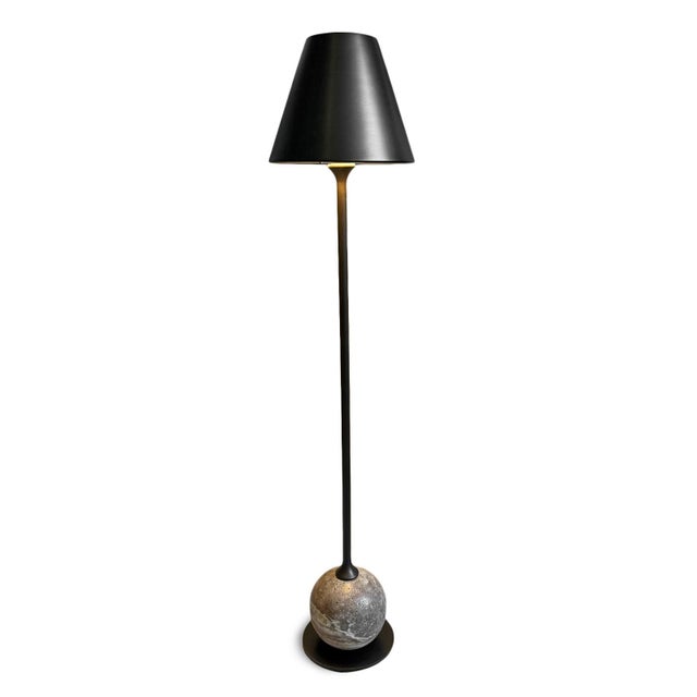Elegant and refined, this tall table lamp pairs a slim bronze empire shade with a long, slender neck accented by graceful...