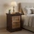 Dimensions: 25" W x 18" D x 34" H Antique door from mid 1900s has been repurposed to craft this rustic nightstand. Layers...