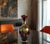 This 12‑inch Venetian art glass vase is a richly ornate example of traditional Italian luxury, glowing in a vivid...