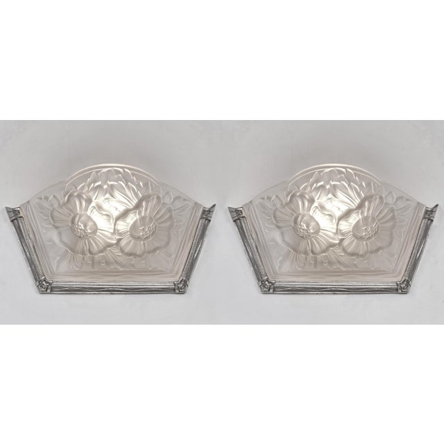 Mouynet & Verdun A nice pair of French art deco wall sconces in nickel plated solid brass or bronze by Henri Mouynet made...