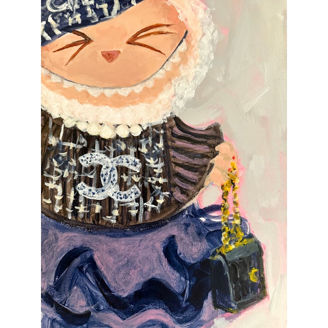 LaBuBu in Paris...playfully reimagines the iconic Chanel style through the whimsical charm of the LaBuBu doll. Dressed in...