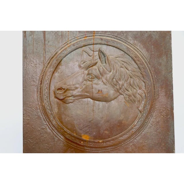 Wonderful cast iron horse theme cast iron fireback element. This piece was probably the middle part of a three piece...