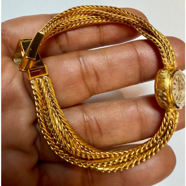 Corum. A lady's 18K gold Multiple Chain bracelet watch 38.5 Gm, 7.25 " Vintage 5 chain belts bracelet watch Manufacturer:...