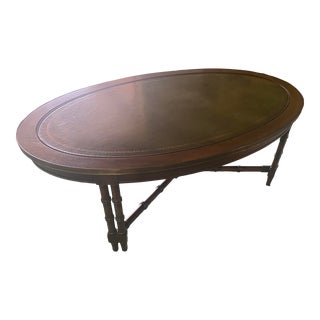 Mid 20th Century Regency Leather Top Oval Coffee Table For Sale