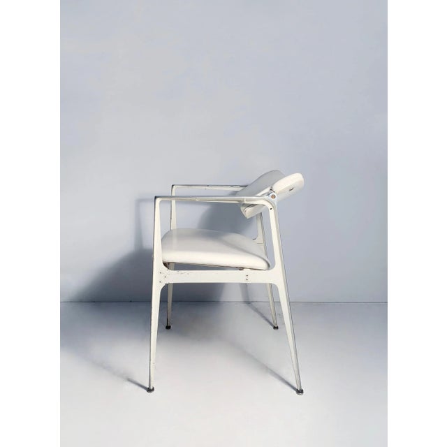 Cast aluminum chair designed by Dan Johnson for Shelby Williams. Manufactured by Crucible Products. This appears to be a...