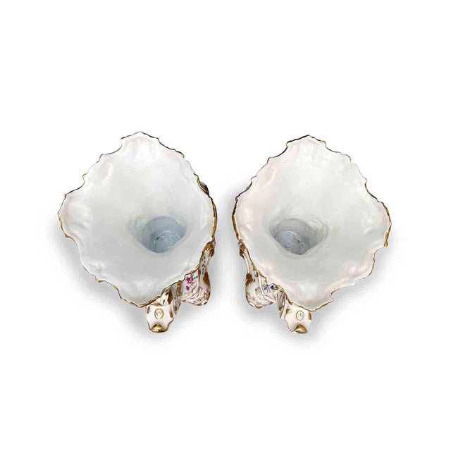 Pair of French Porcelain Cornucopia Vases, Late 19th Century. An elegant pair of late 19th-century neo-rocaille tulip...
