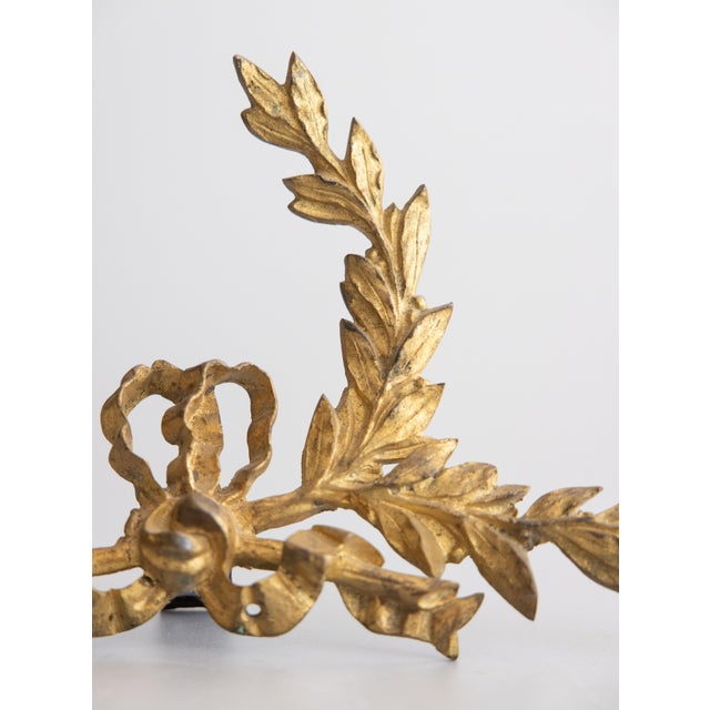 A gorgeous antique 19th-Century French gilt bronze ormolu bow and garland appliqué tabletop fragment or swag with an easel...