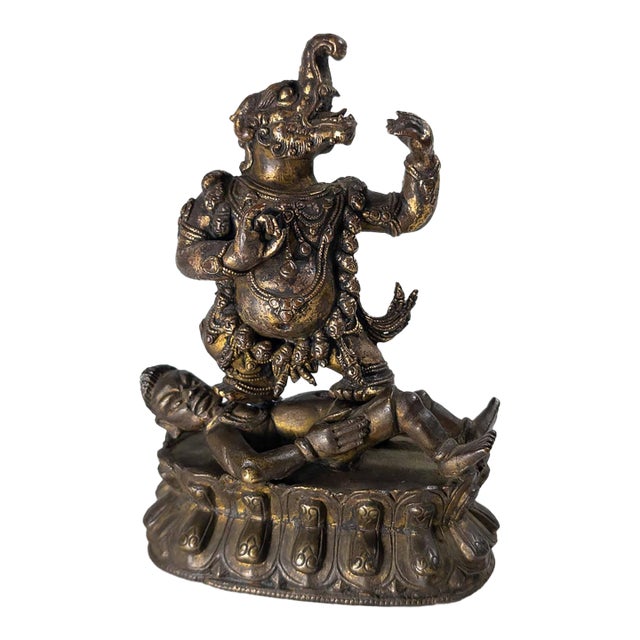 17th or 18th Century Chinese Sino-Tibetan Gilt Bronze Buddhist Makala Faced Deity Figure For Sale