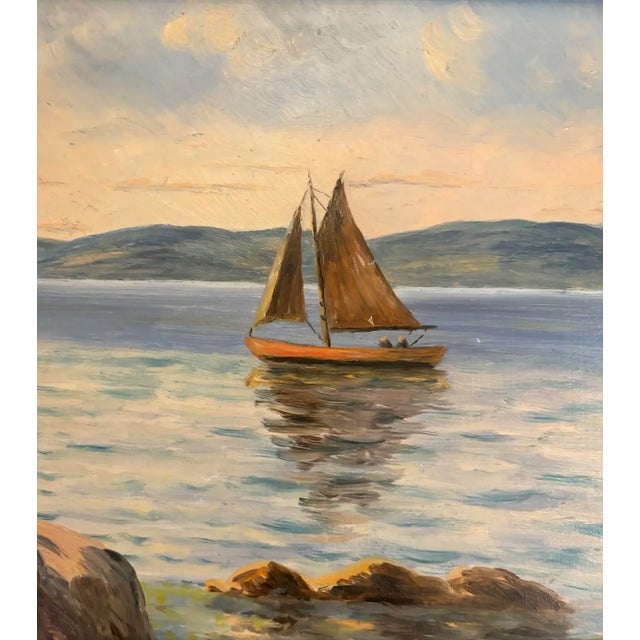 Lovely mid-century seascape oil painting on board. Signed/framed in original metallic frame.