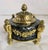 A fine late 19th-century French gilded ormolu inkwell stand, standish or decorative paperweight dating to circa 1870–1880,...