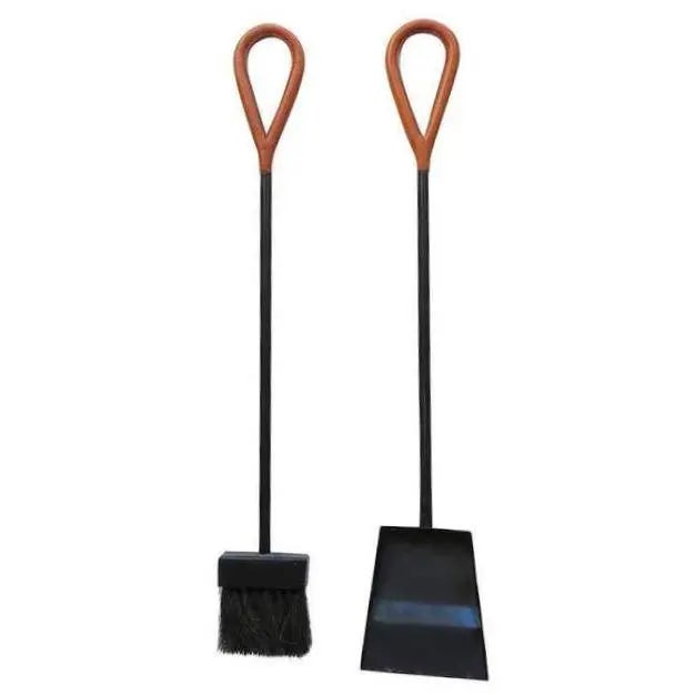 Fine Jacques Adnet modernist fire tools with hand-stitched saddle leather handles atop wrought iron. This set includes a...
