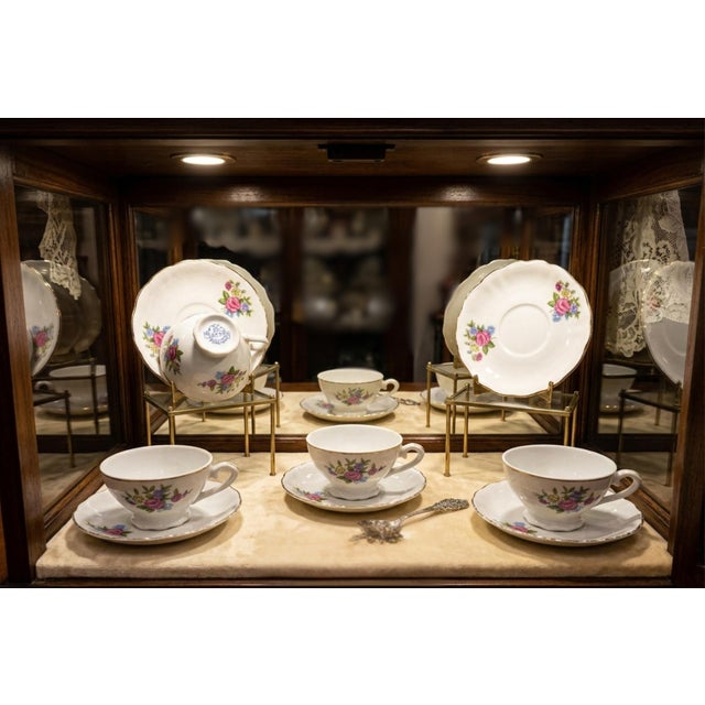 Elegant vintage set of 6 cups and 6 saucers in fine white porcelain, decorated with a delicate floral motif (pink roses,...