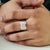 The Modernist Heavy Sterling Silver Unisex Wide Band Ring features a bold, wide-band design adorned with round pavé-set...