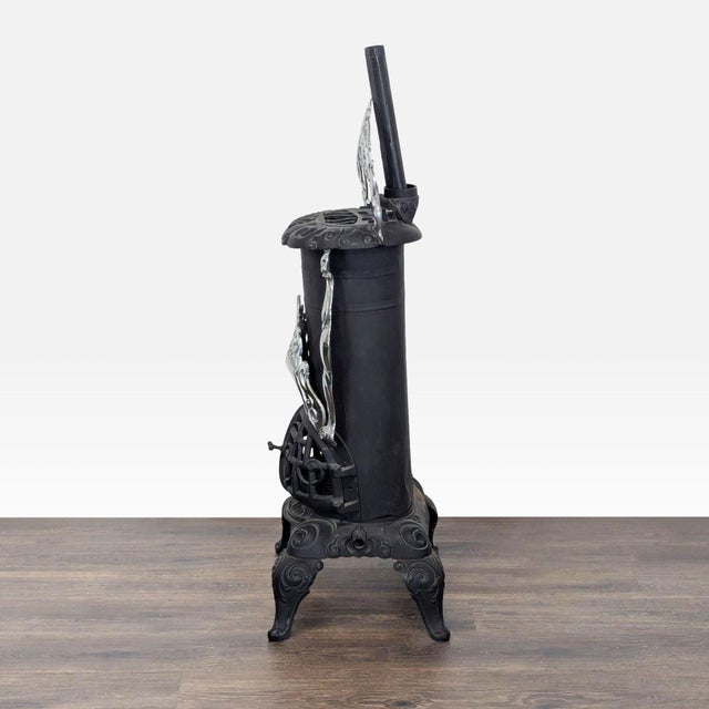 Traditional Vintage Iron Parlor Stove With Ornate Details For Sale - Image 3 of 10