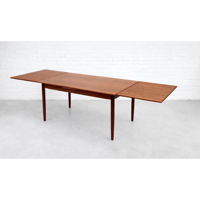 Danish Mid Century Modern Teak Dining Table | Expandable Hidden Leaves, C. 1960’s For Sale - Image 4 of 10