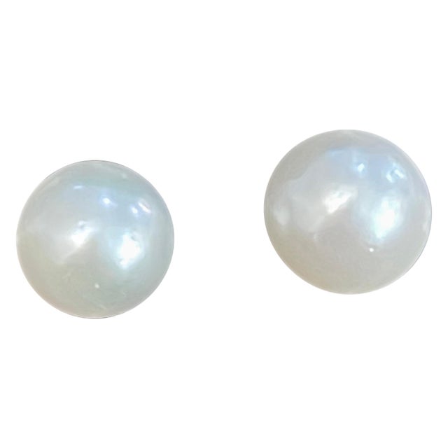 13 MM White South Sea Pearl Stud Earrings 14 Karat Yellow Gold pearls are clean with little bit blemishes .Approximately...