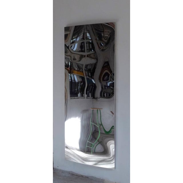 Distorting 200 cm vertical mirror in polished stainless steel by julien vidame. Dimensions: w 94 x d 3 x h 200 cm....