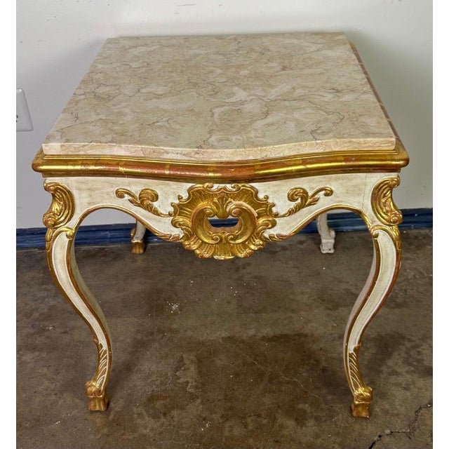 19th Century French Rococo style white colored painted & parcel gilt table. The Rococo style flourished in Europe,...