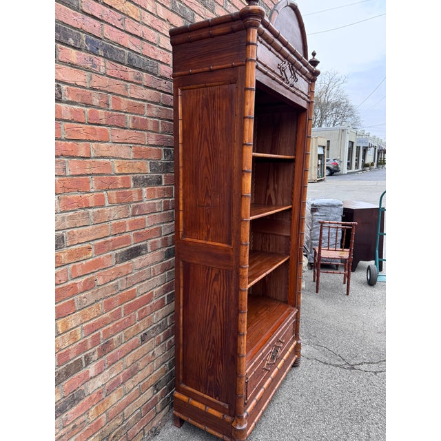 This 19th Century French faux bamboo book case is an uncommon find. The shading of this item makes it particularly...