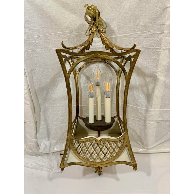 How is this for charming? gilded iron and painted tole come together to make a wonderful and unusual lantern or...