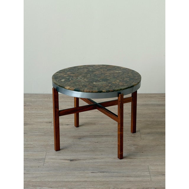 Mid-century round side table attributed to Arvid Hærem, manufactured by Sola Møbelfabrikk, Norway. The circular top...