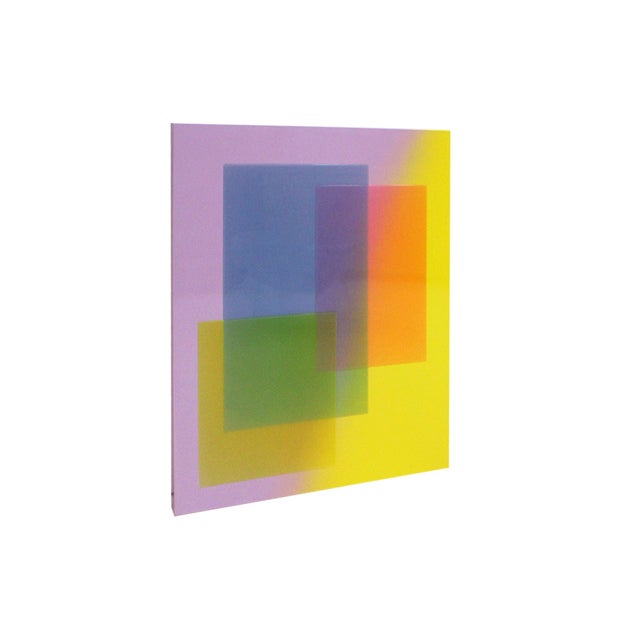 This work by Fernando de Ana is part of his visual exploration of the overlay of translucent geometric planes, where color...