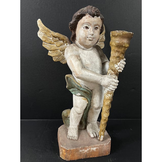 ITEM NAME: VINTAGE CARVED WOOD STANDING ANGLE WITH GALSS EYES SCULPTURE ORIGIN: PHILIPPINES AGES: LATE 20TH CENTURY...