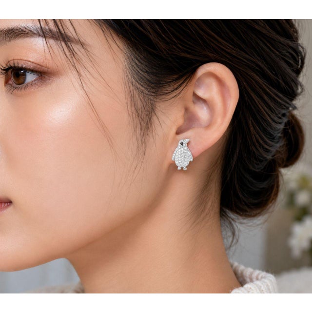 Lovely Whimsical 14K White Gold Diamond Penguin Earrings. Metal: 14K White Gold Gemstones: Numerous Round Diamonds - Total...