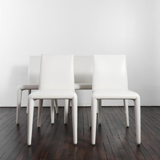 Vol Au Vent Dining Chairs by Mario Bellini, 2000s, Set of 4, in Very Good conditions. Designed from 2000 This piece has an...