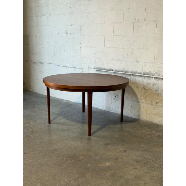 Wood Dyrlund Lotus Round Teak Dining Table With Flip-Out Extension Leaves – Vintage Danish Mid-Century Modern For Sale - Image 7 of 12