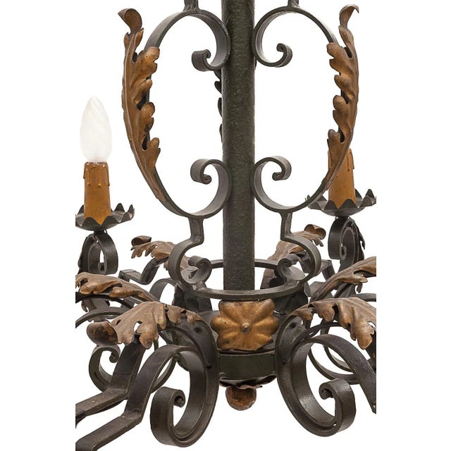Together. Large chandelier and 2 sconces. Attributed to Gilbert Poillerat. Rare group of origin. Wrought iron. Gilding....